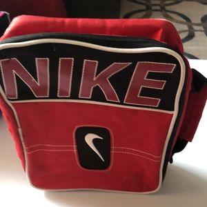 Nike Red Lunchbox 10 inches by 8 inches by 3 inches tall